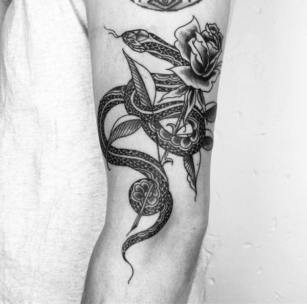 traditional Snake & Rose tattoo on arm