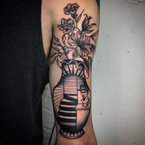 Surrealist Vase tattoo on arm