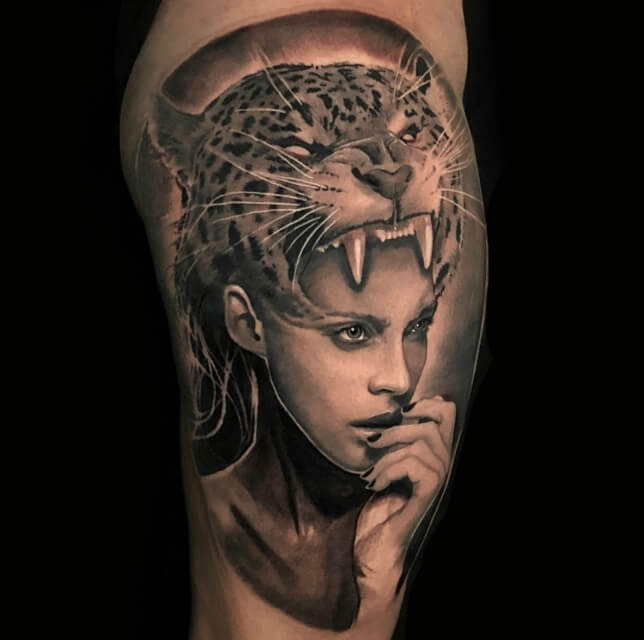 Calf leg portrait tattoo in black and grey realism by Alo Loco