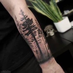 Forest tattoo on arm