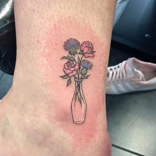 Tattooantra on Twitter My new mixed style realistic rose on a traditional  vase with traditional flowers Done by Yogi Barrett at Messenger Tattoo  Studio in Senoia GA httpstcog5LyBr8fqd httpstcosvikwLpD0v   Twitter