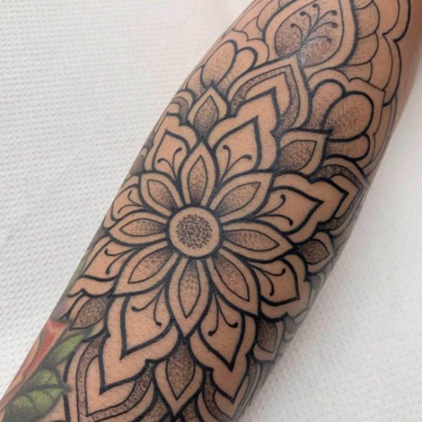 Intricate mandala tattoo by Nikki, a London tattoo artist