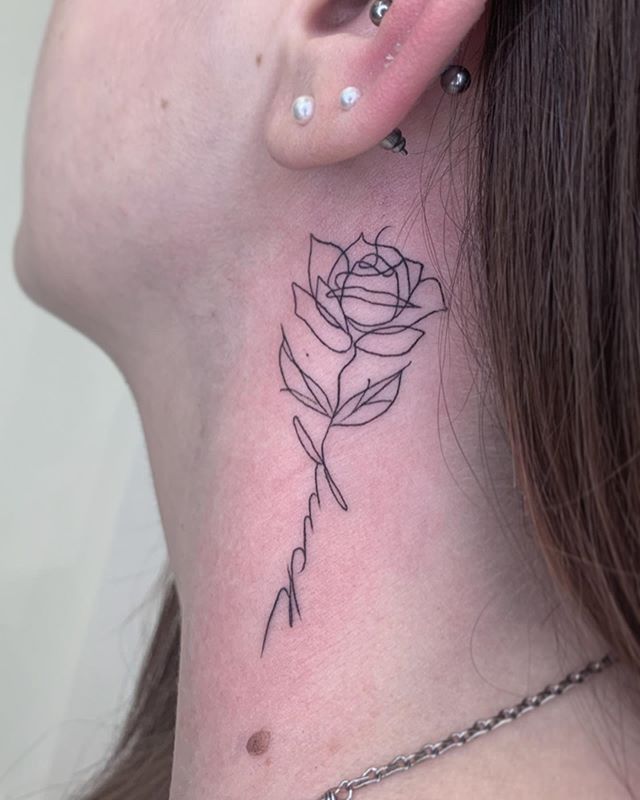 Fine line rose on the neck tattoo