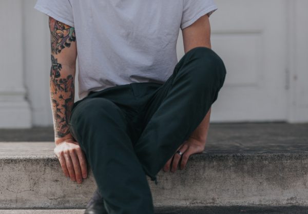 man with tattoos on arm